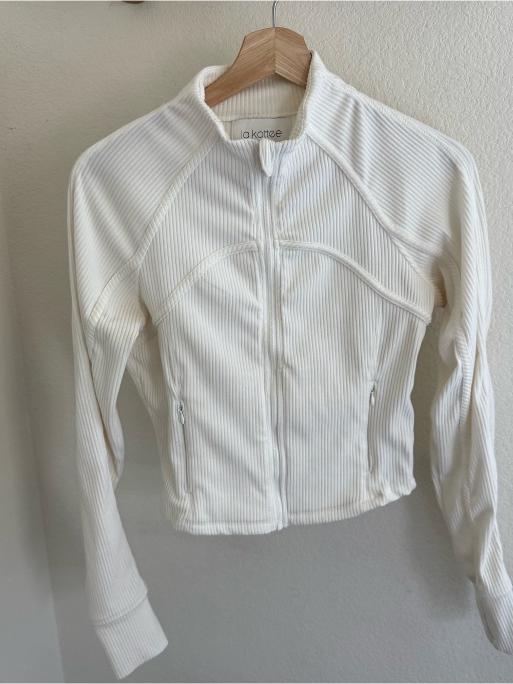La Kottee minimalist sporty chic athleisure White Ribbed Activewear jacket